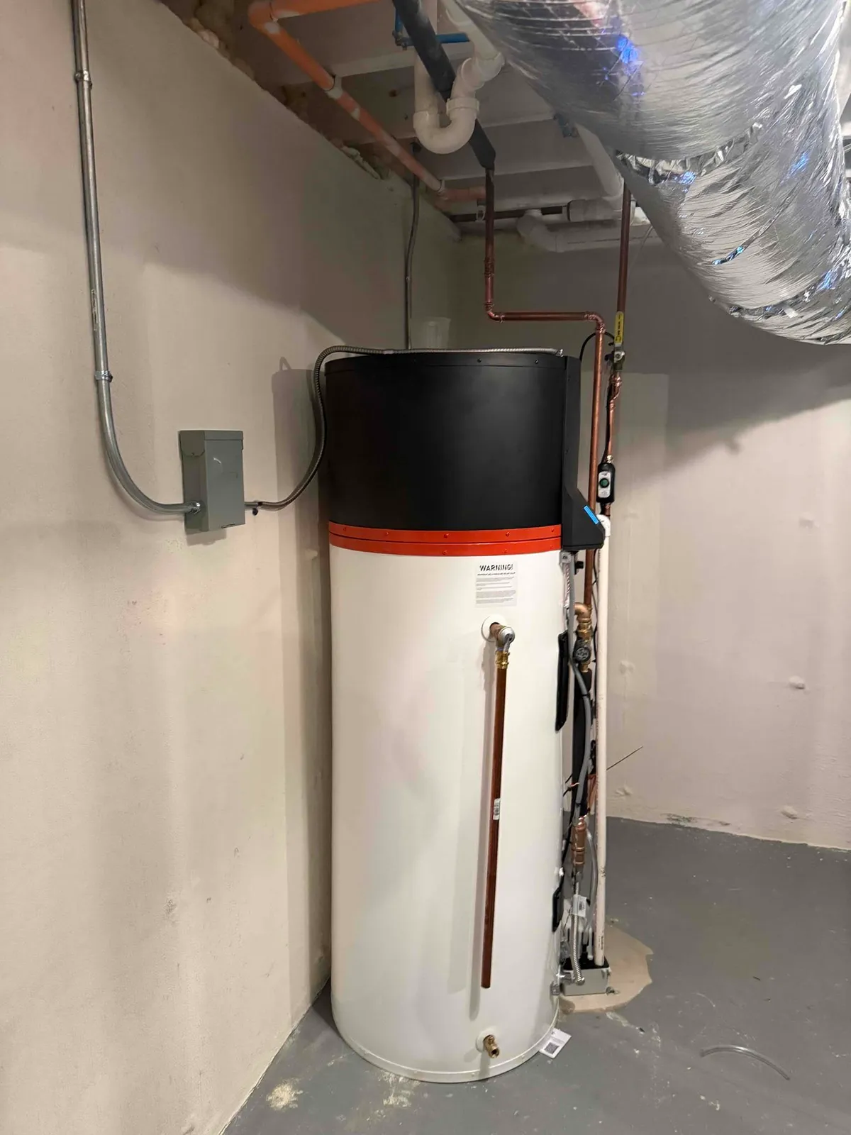 Heat-pump water heater with a new dedicated circuit, disconnect, and conduit installed